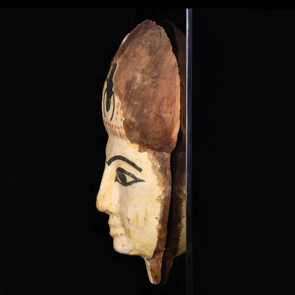 An Egyptian Wooden Mummy Mask, 21st Dynasty, ca. 1069 - 945 BCE